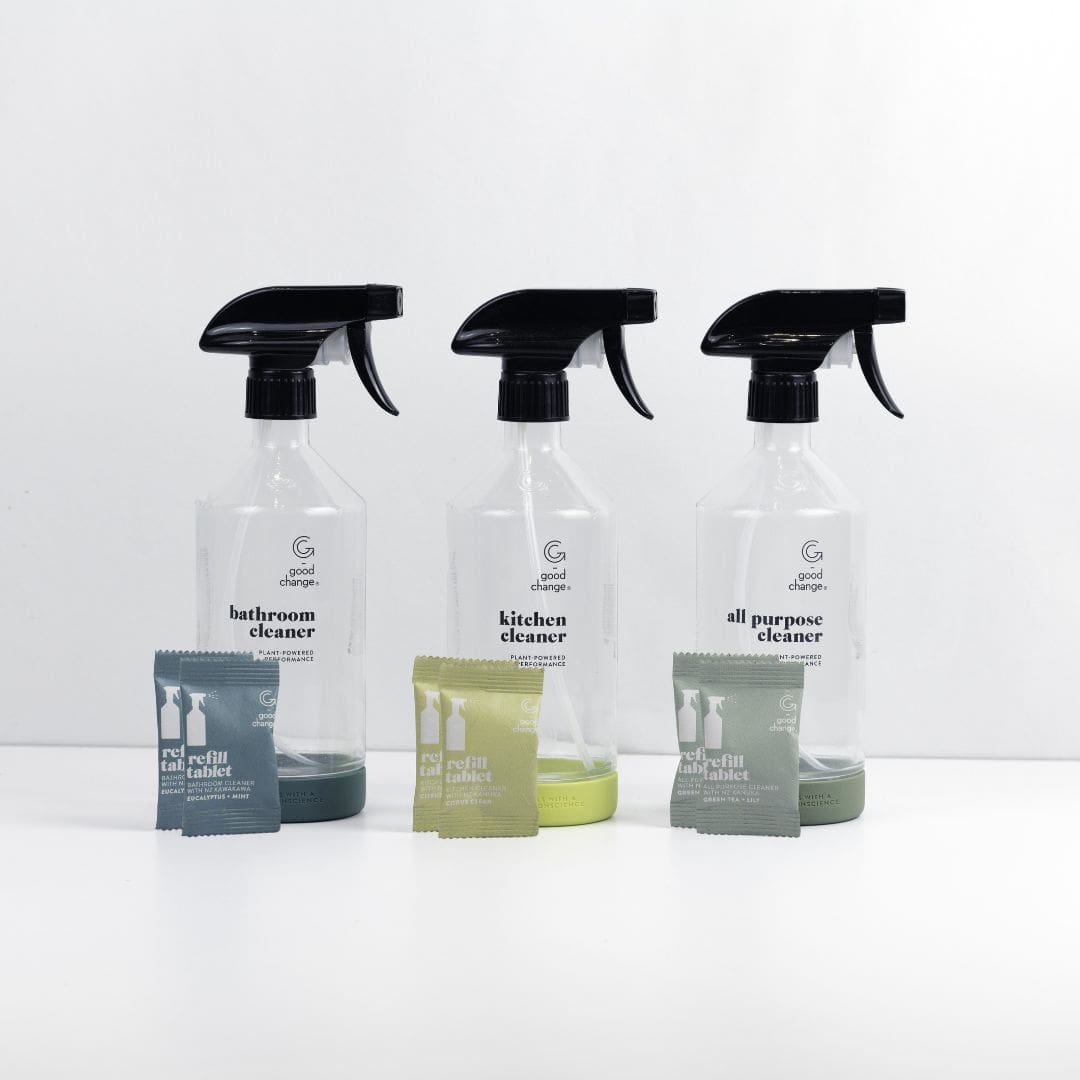 Refillable cleaning spray bottle system with glass bottles and dissolvable cleaning tablets