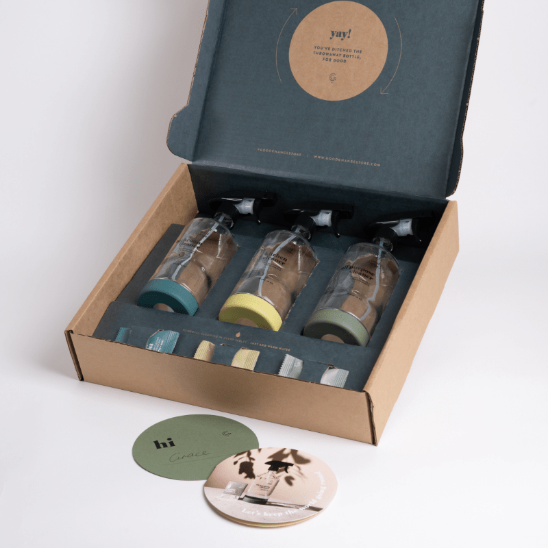 All three bottles and cleaning refills pictured in their box